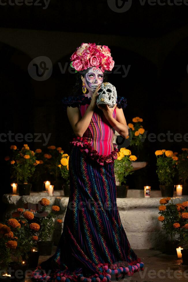 Calavera Catrina sitting on a throne. Sugar skull makeup. Dia de los muertos. Day of The Dead. Halloween. photo