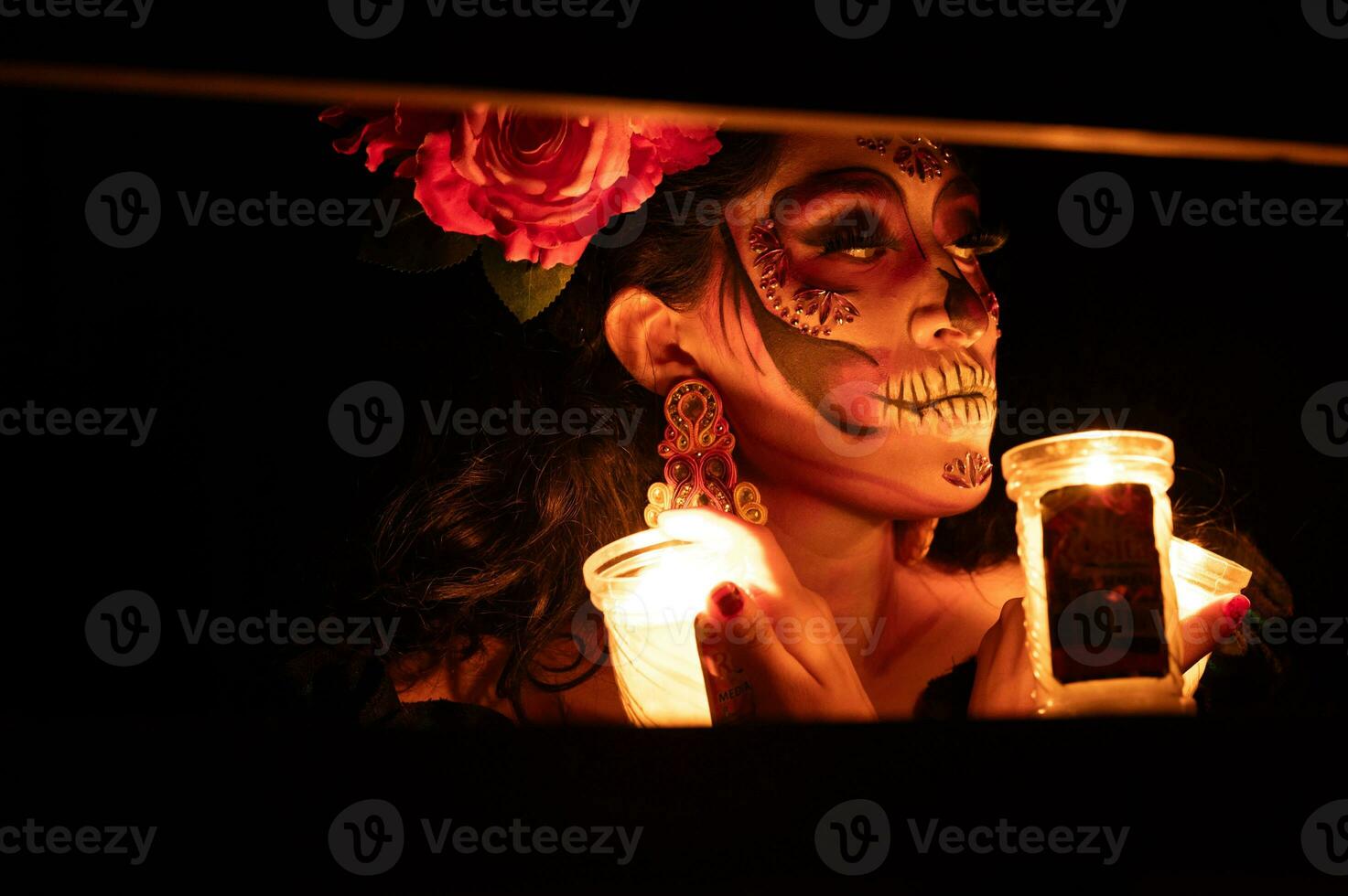 Calavera Catrina sitting on a throne. Sugar skull makeup. Dia de los muertos. Day of The Dead. Halloween. photo