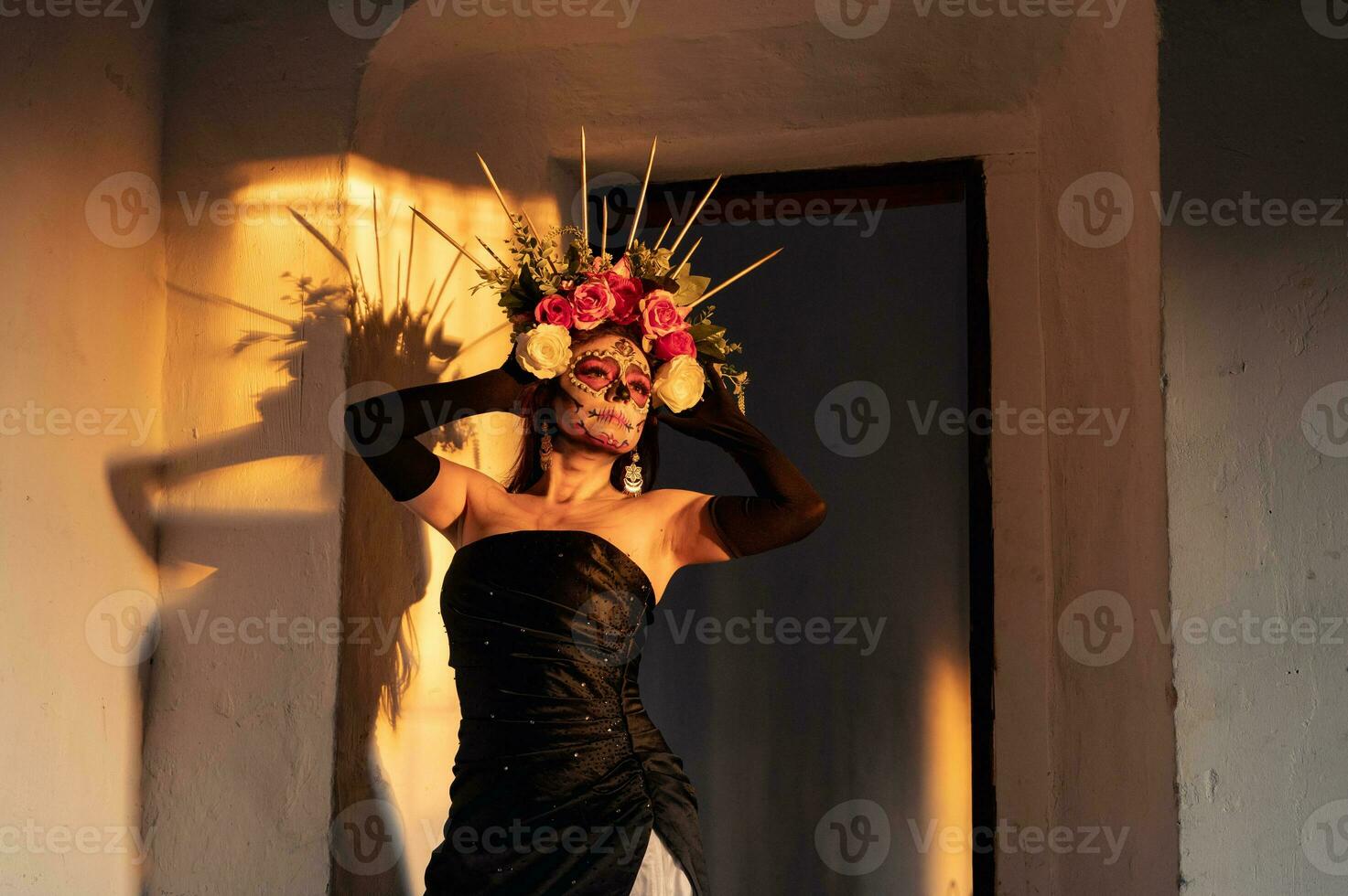 Portrait of a girl with sugar skull makeup over black background. Calavera Catrina. Dia de los muertos. Day of The Dead. Halloween. photo