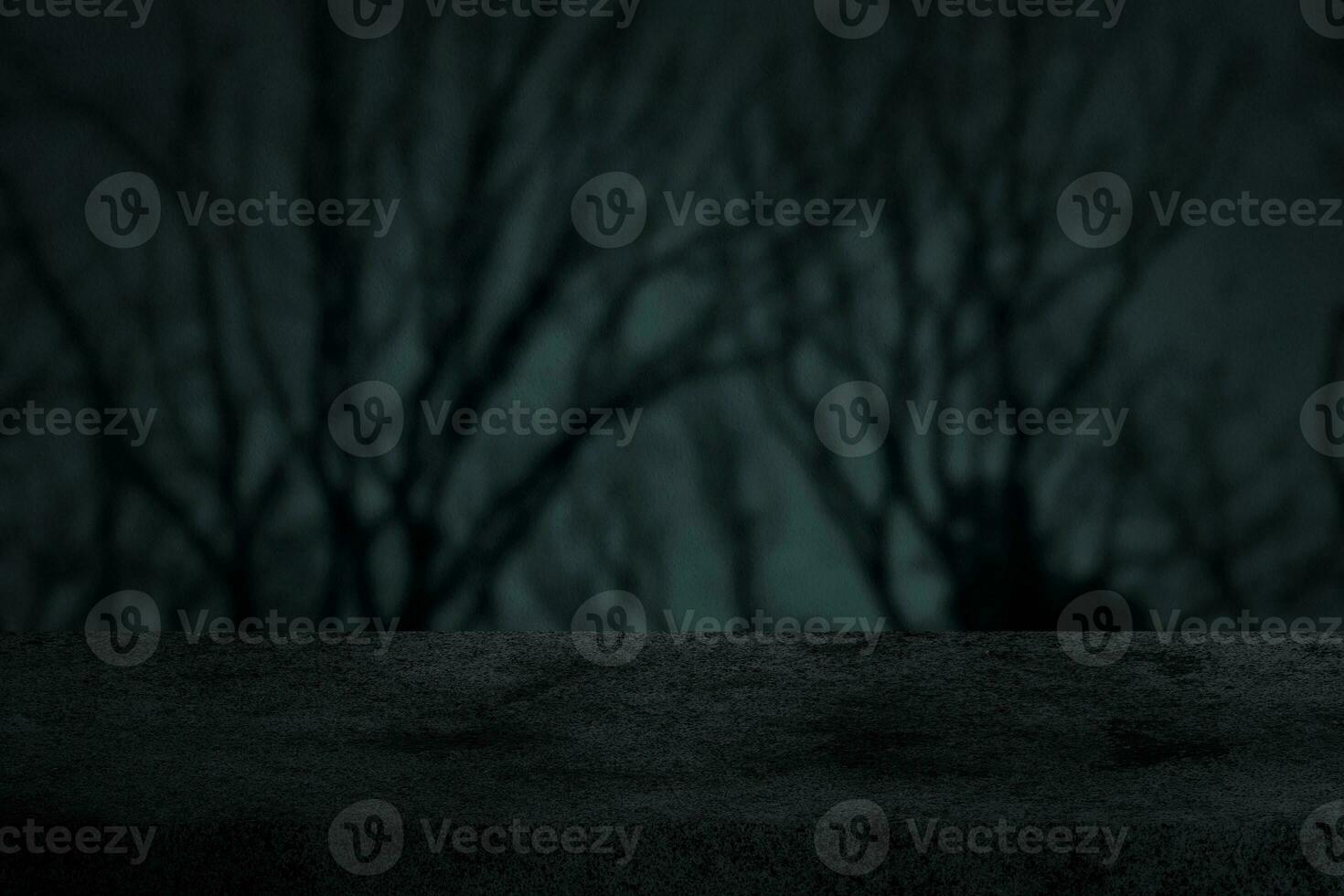 Concrete Table with Scary Tree Shadow on Concrete Wall Texture Background in Dark Tone, Suitable for Product Presentation Backdrop, Display, and Mock up for Halloween Concept. photo