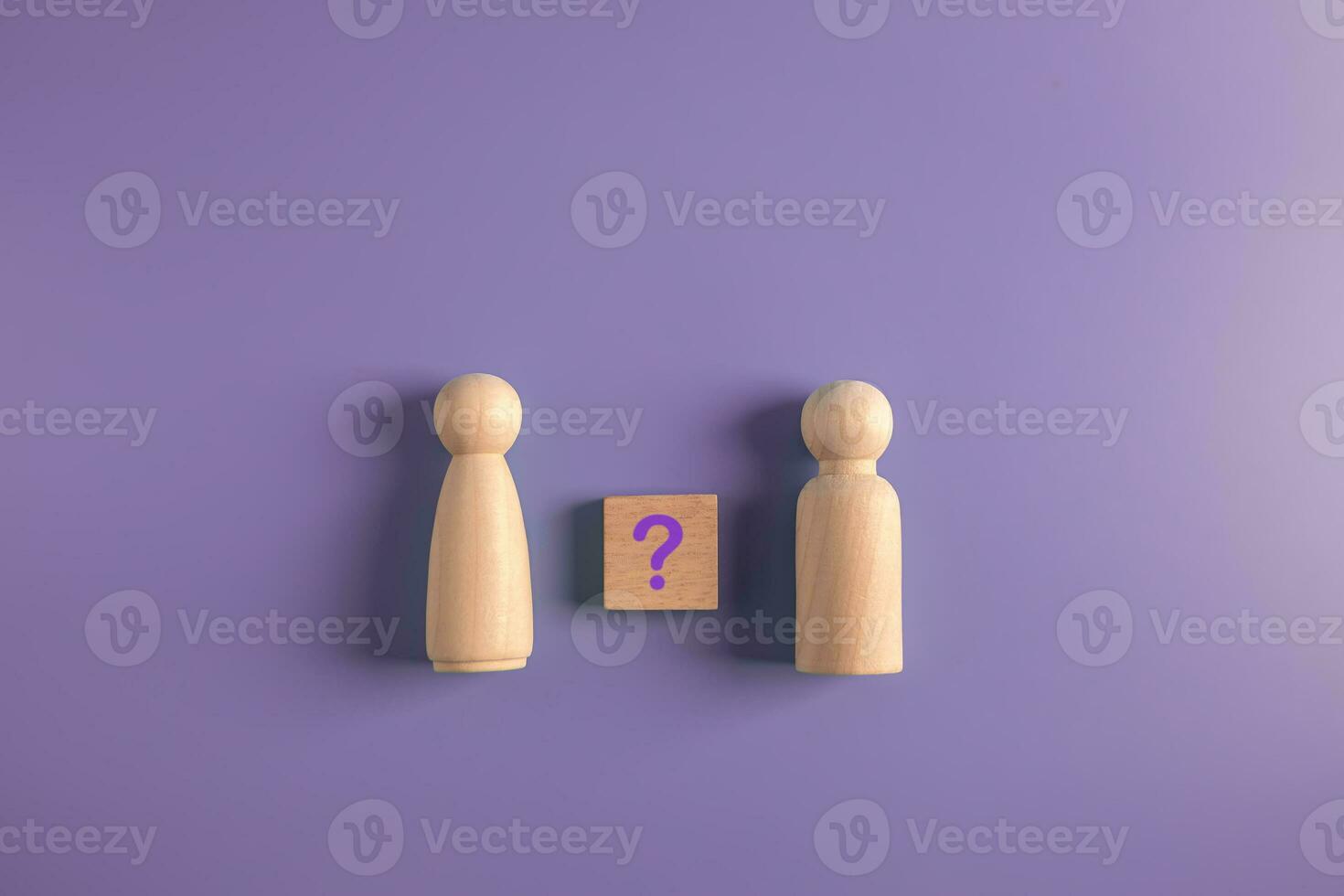 unknown relationship and love unlove concept.wooden couple with unknown status question mark icon on purple background. photo