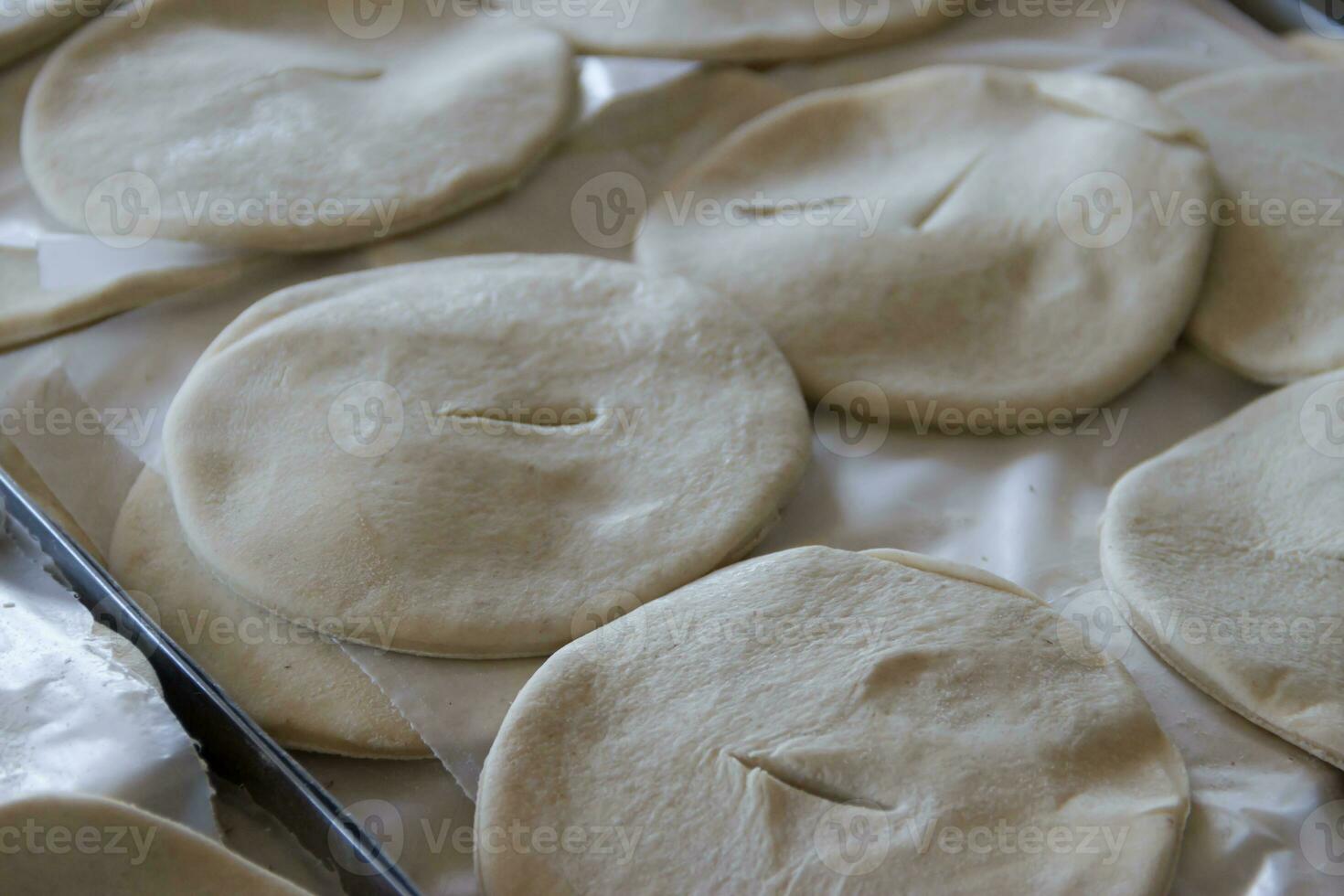 tray of fried cakes raw gastronomia tipica argentina photo