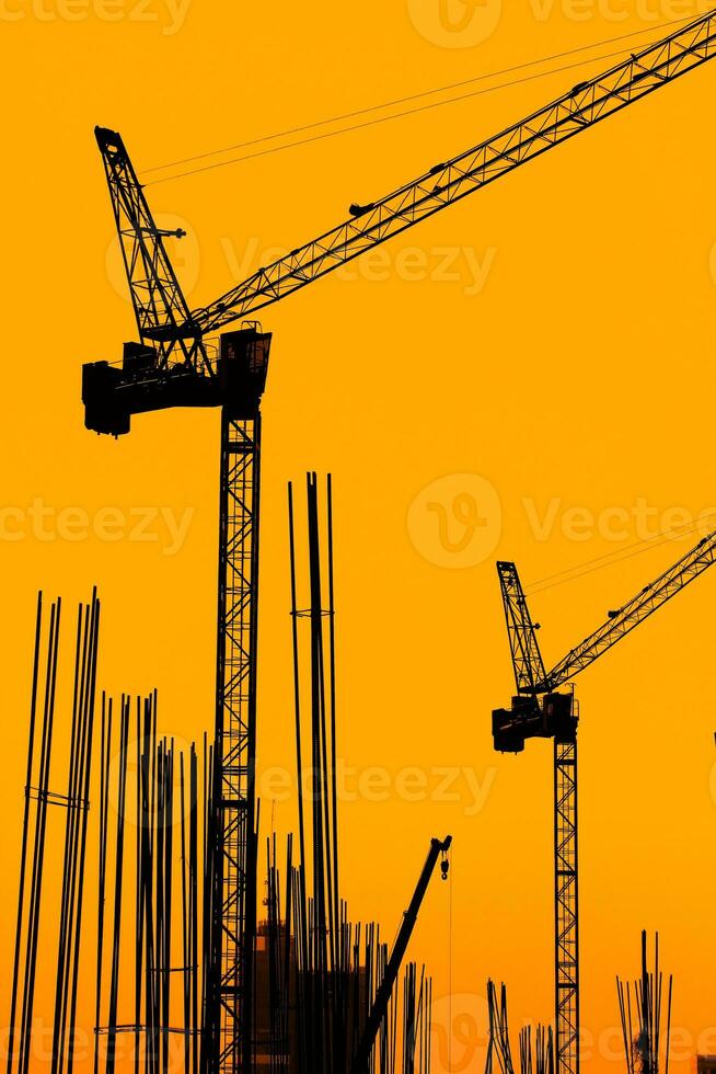 Building Construction with Cranes in the evening. photo