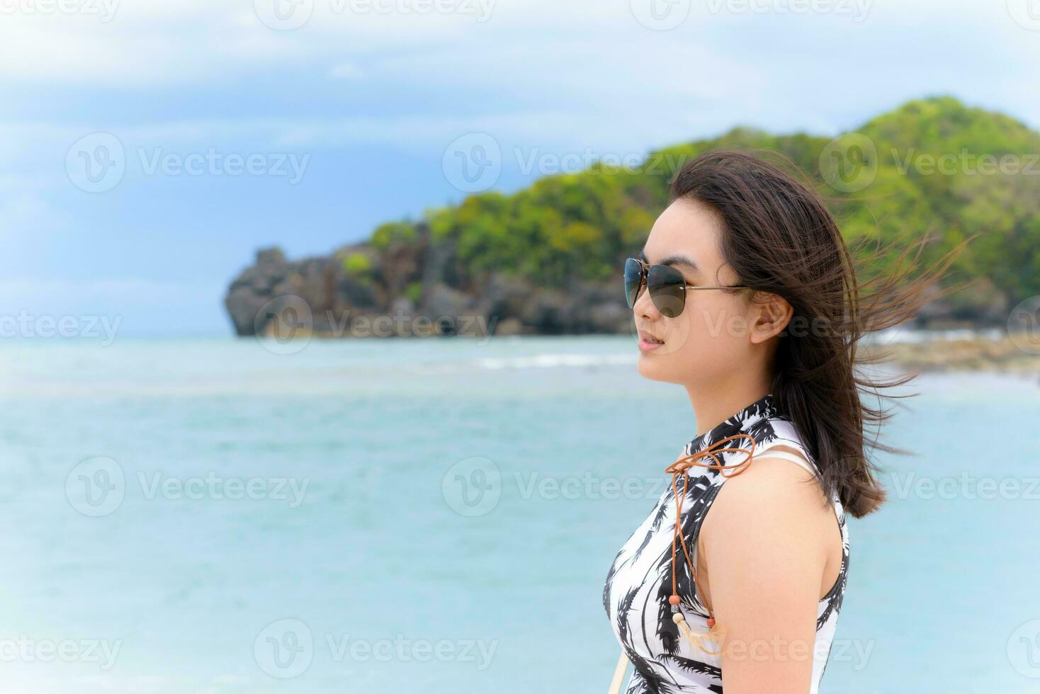 Woman tourist on the beach in Thailand photo