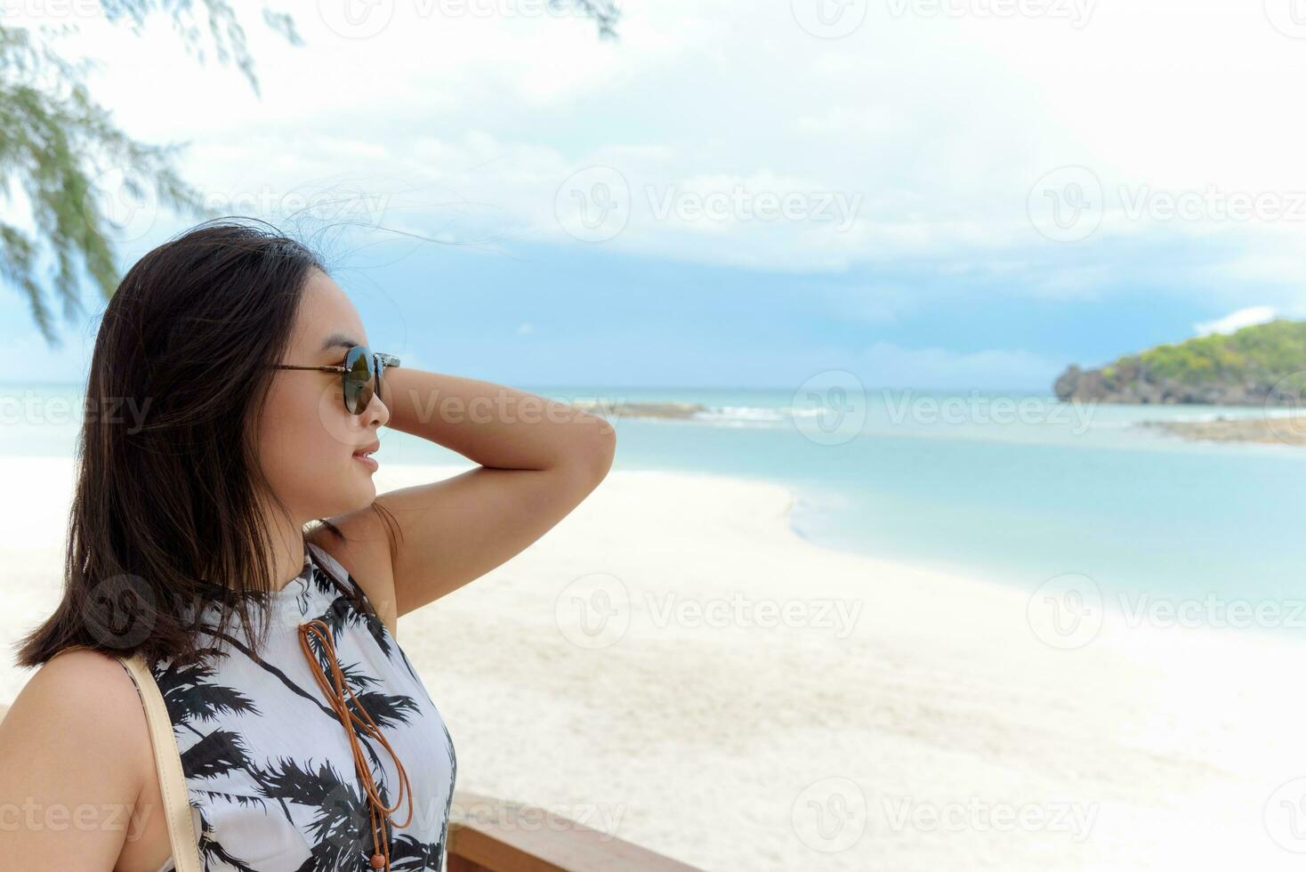 Woman tourist on the beach in Thailand photo