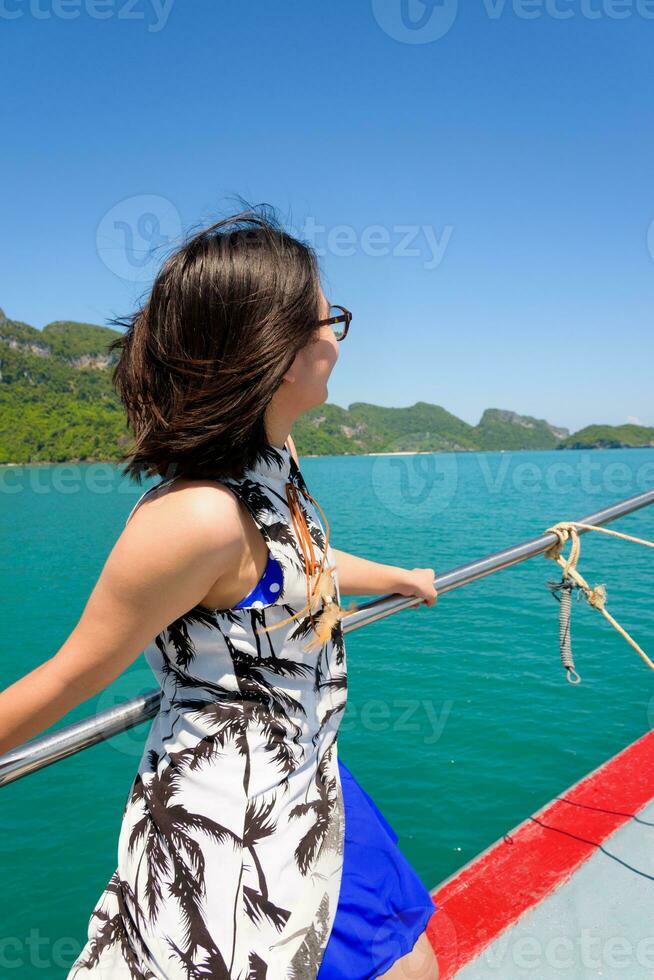 Young woman on the boat photo