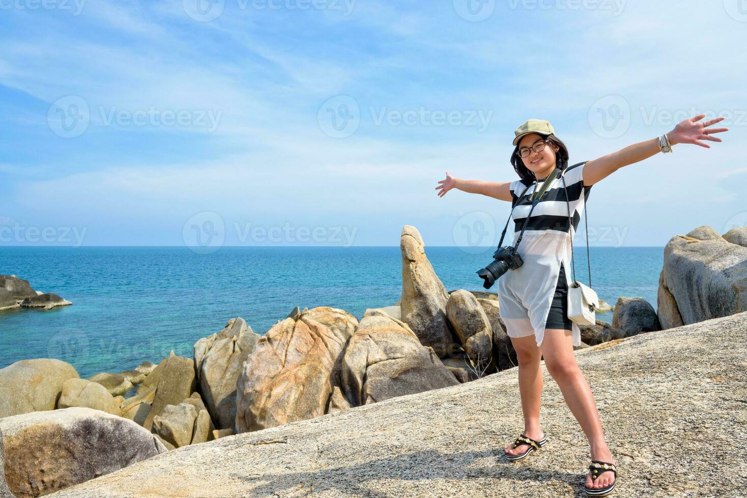 Woman tourist on Hin Ta Hin Yai viewpoint photo