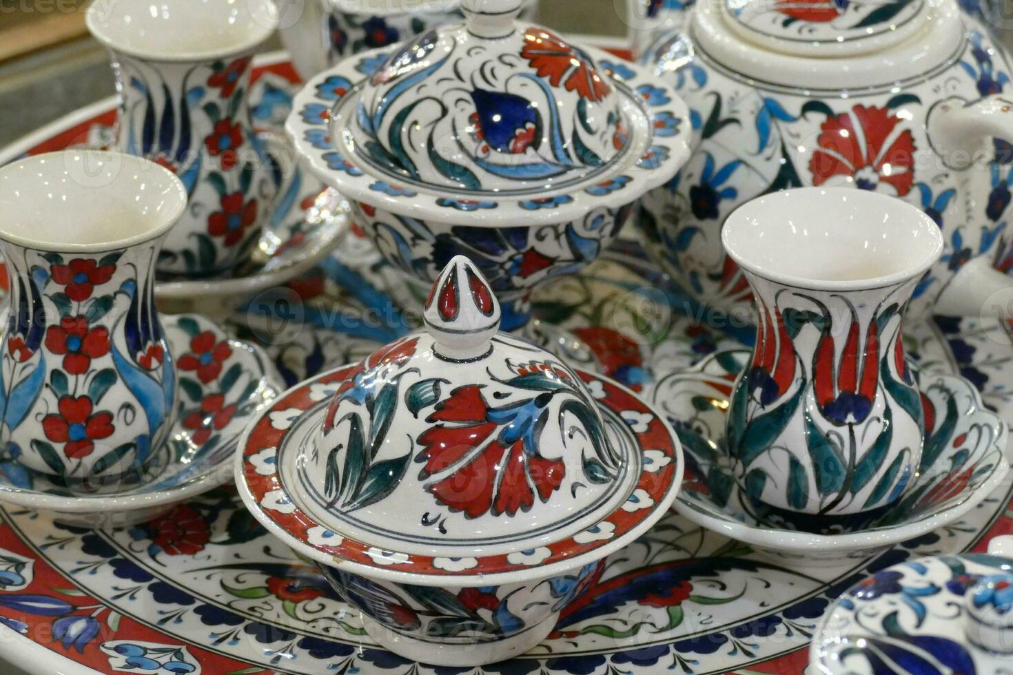 Pottery displayed in cave factory showroom photo