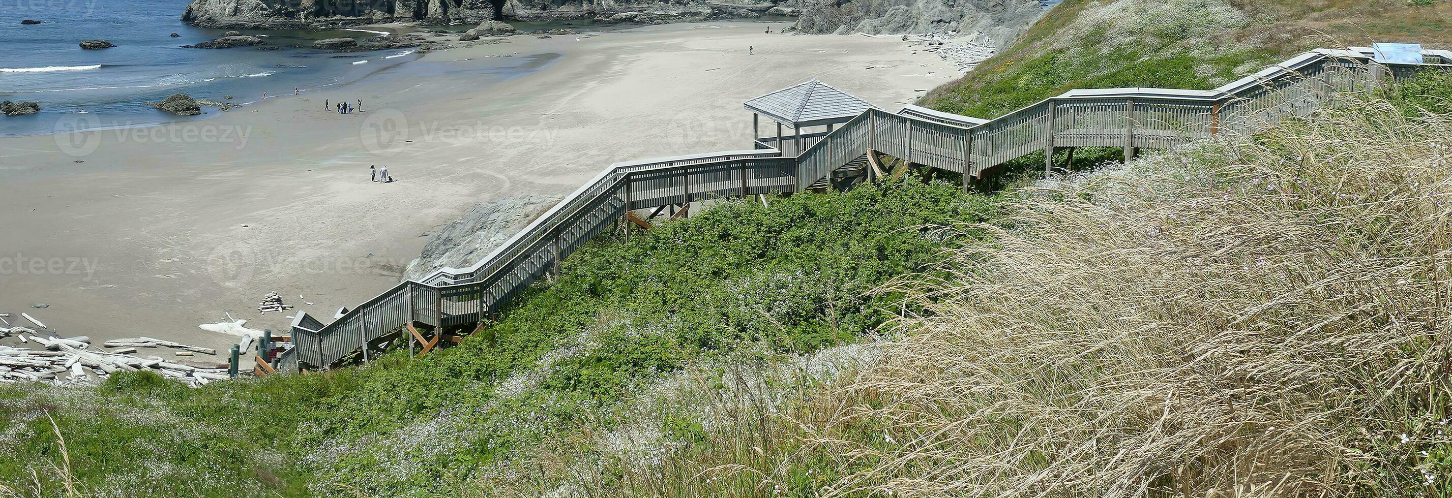 Steep wooden stairway on Bandon beach,  Oregon coast photo