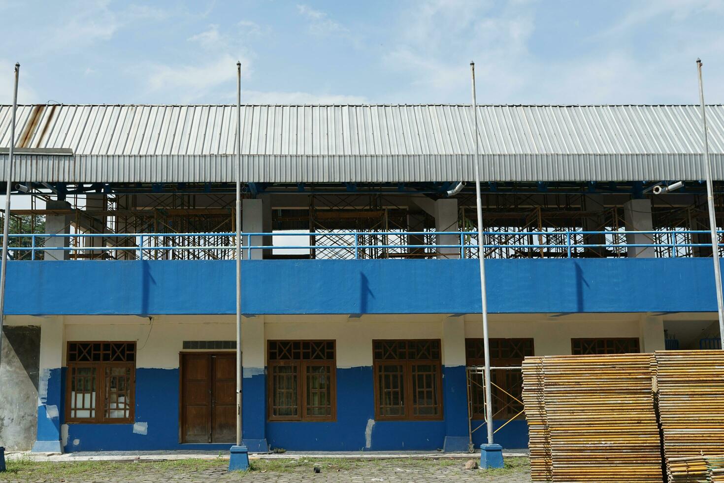 sports field stadium renovation with plug and wall photo