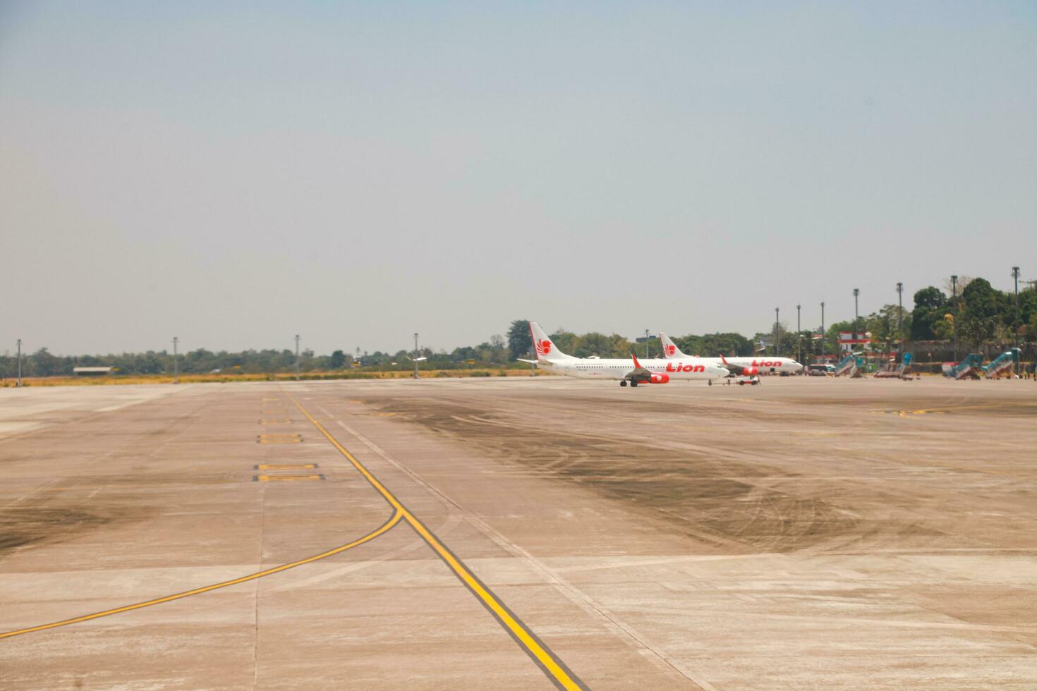 Makassar, Indonesia - September 21th 2023, Several large aircraft from the Indonesian airline and unloaded at Sultan Hasanuddin International Airport, Makassar. photo