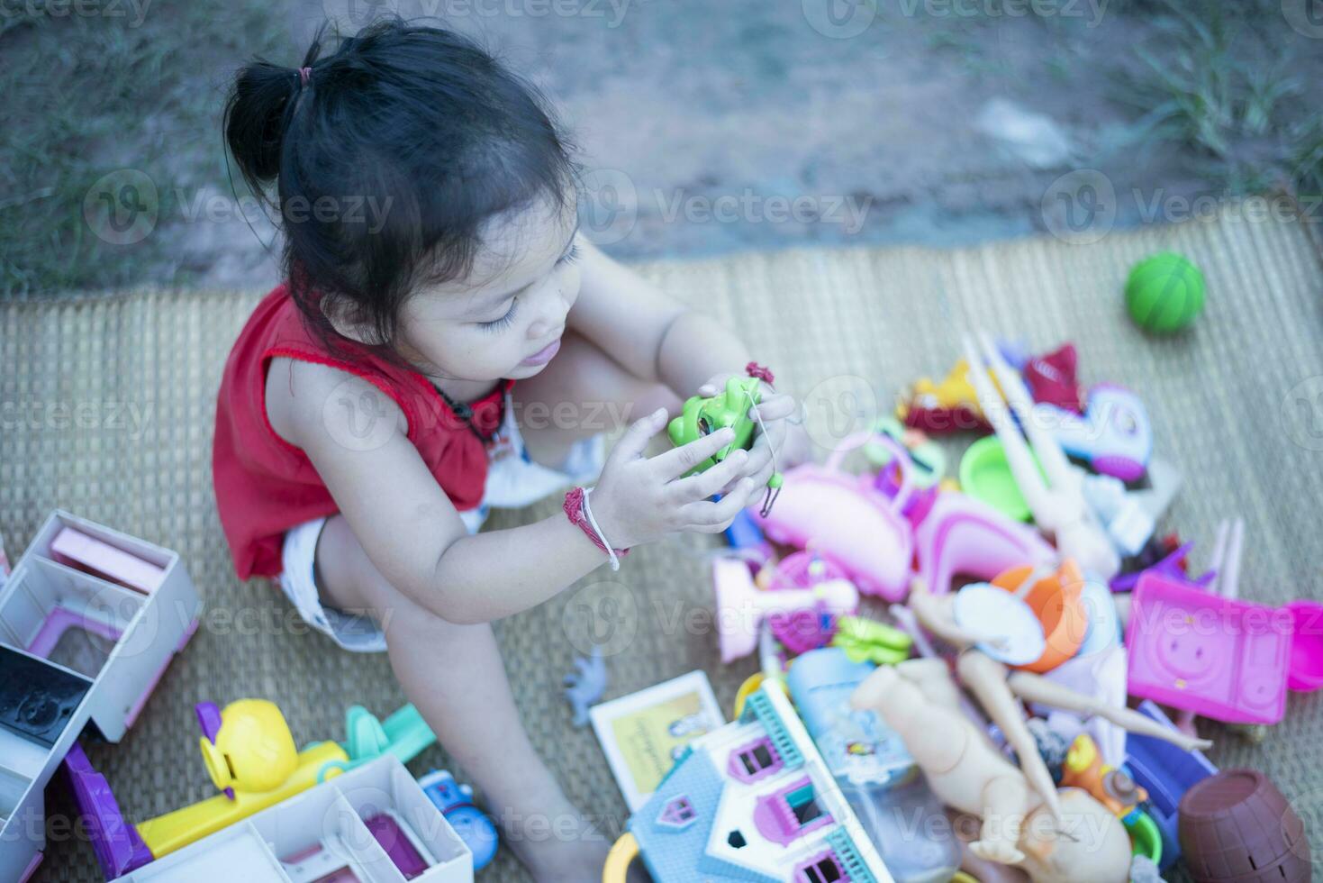 Children play with colorful toys Children play educational and creative toys and games for young children at home. photo