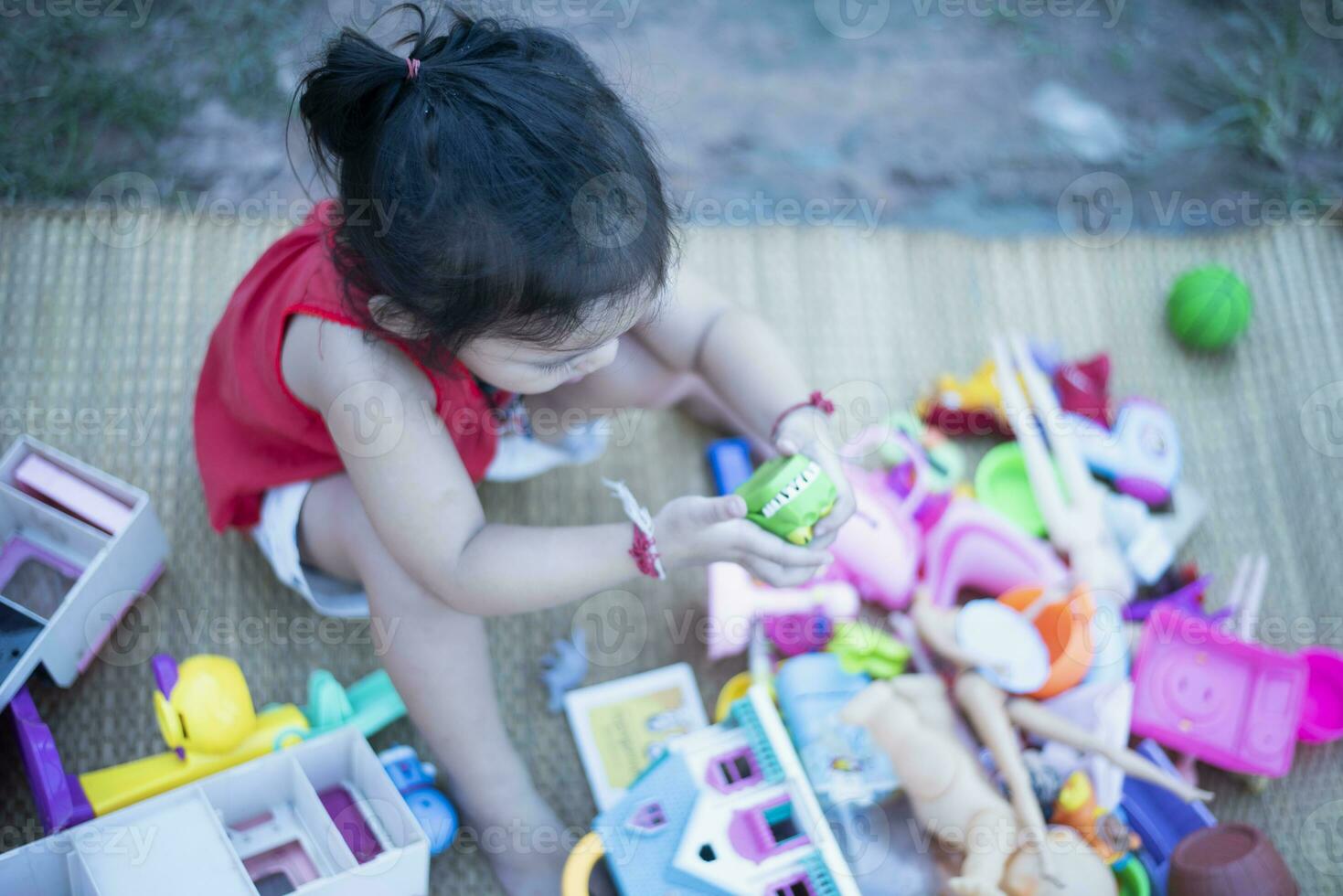 Children play with colorful toys Children play educational and creative toys and games for young children at home. photo