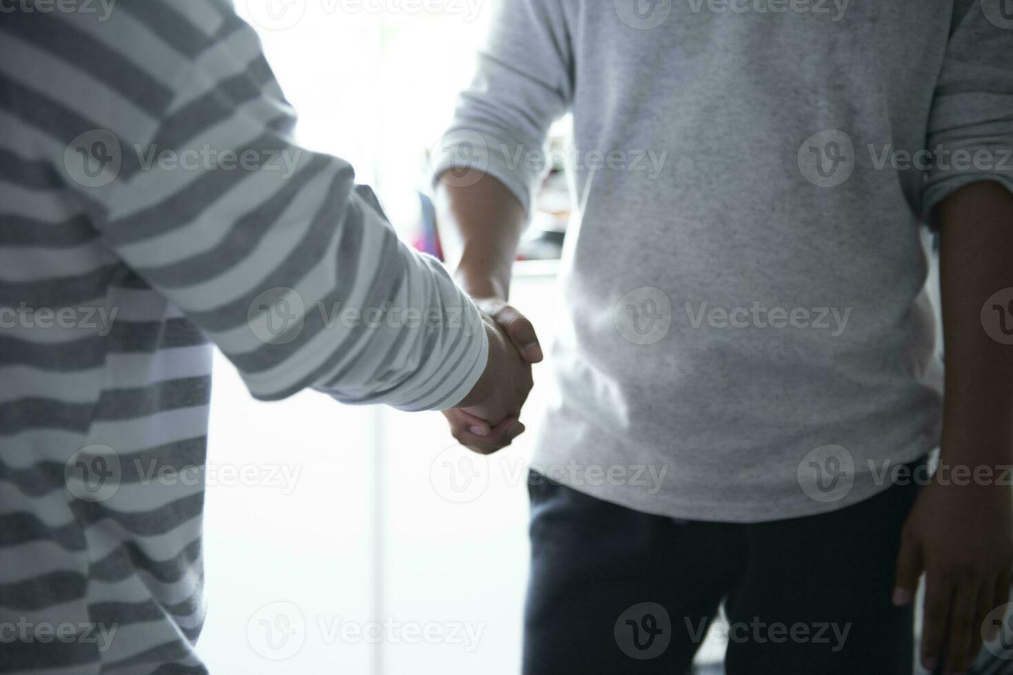 team shaking hands Accomplishment Agreement or Thank You for Supporting the Office Trust or motivation after a b2b business meeting or partnership in welcome and strategy documents. photo