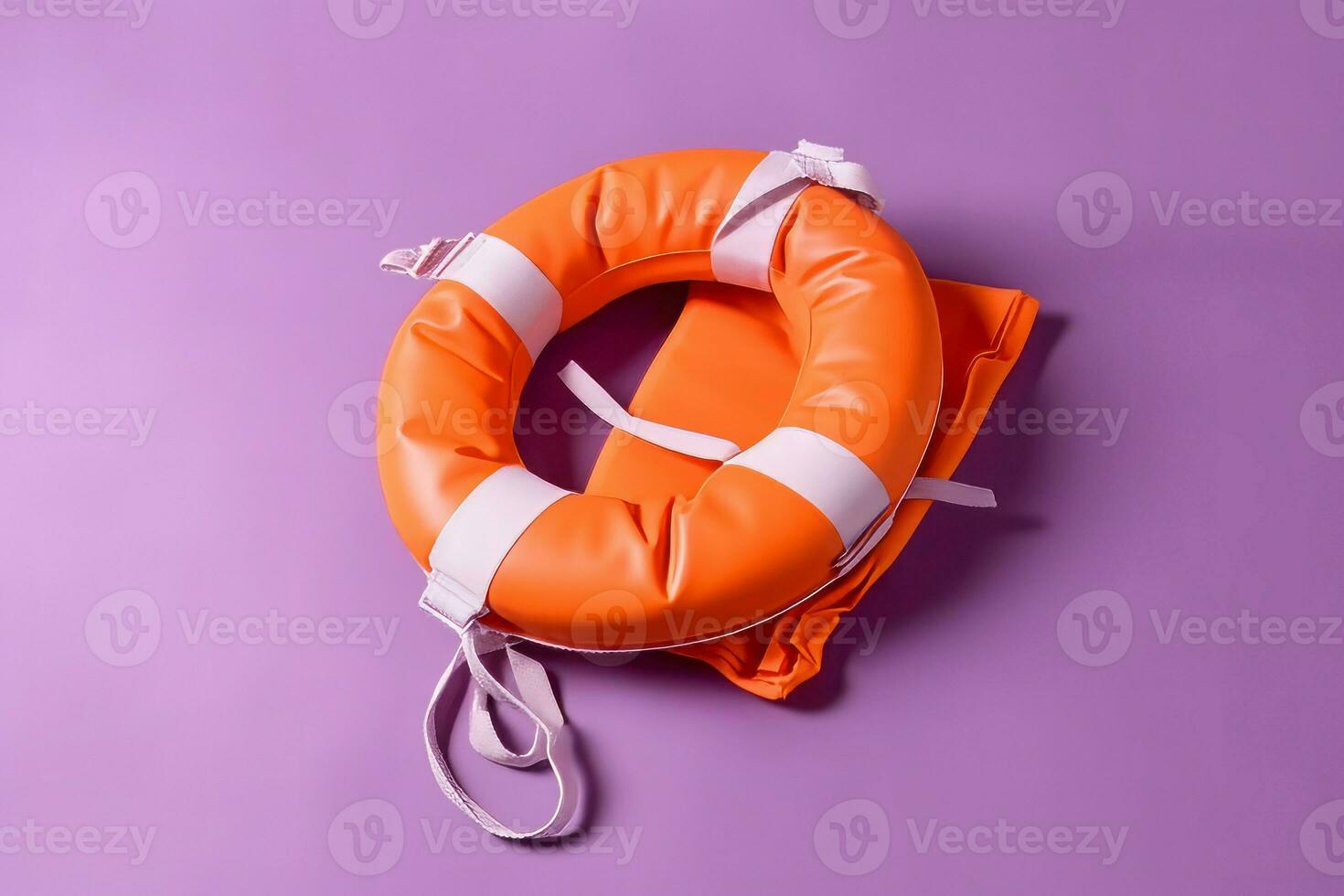 Orange life jacket and lifebuoy on violet background. Generate Ai photo