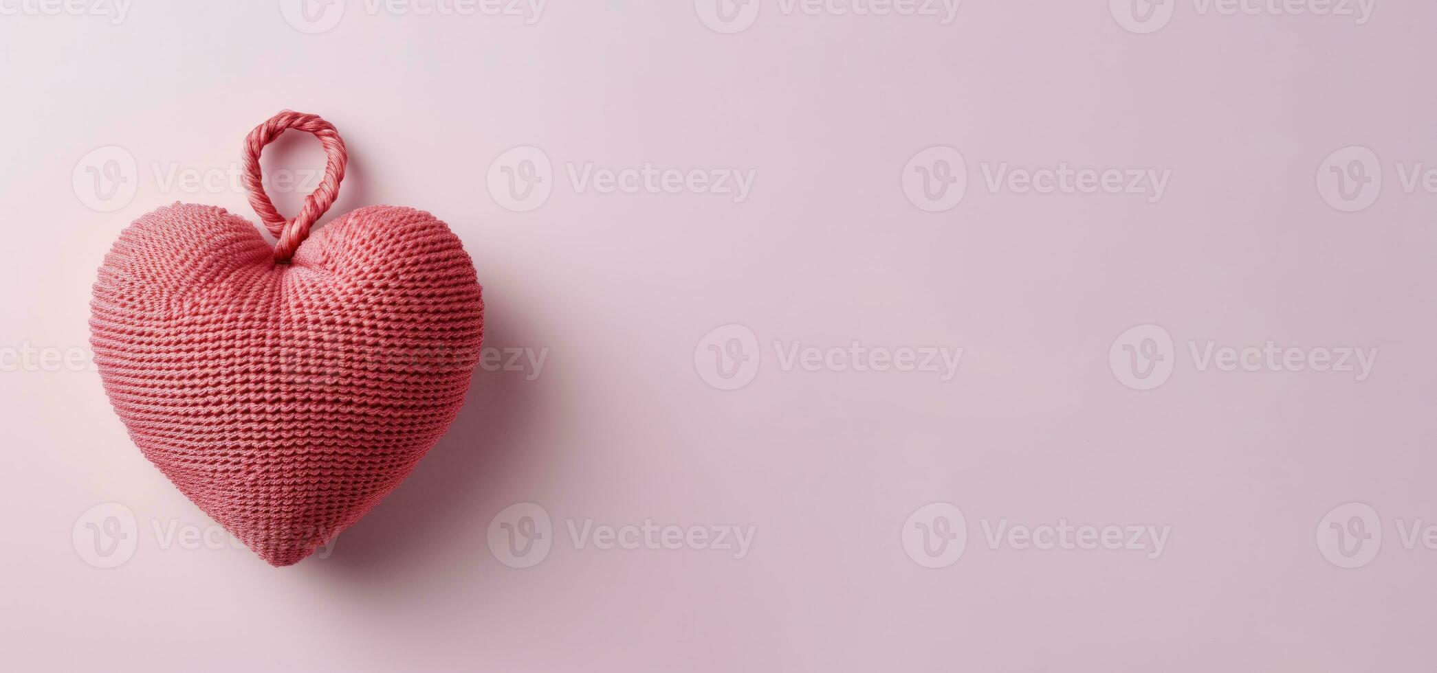 Banner with knitted heart on pik background ai created photo