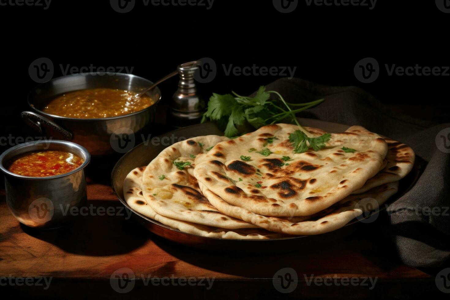 Traditional naan bread accompanied by a flavorful bowl of gravy in dinning table ai created photo