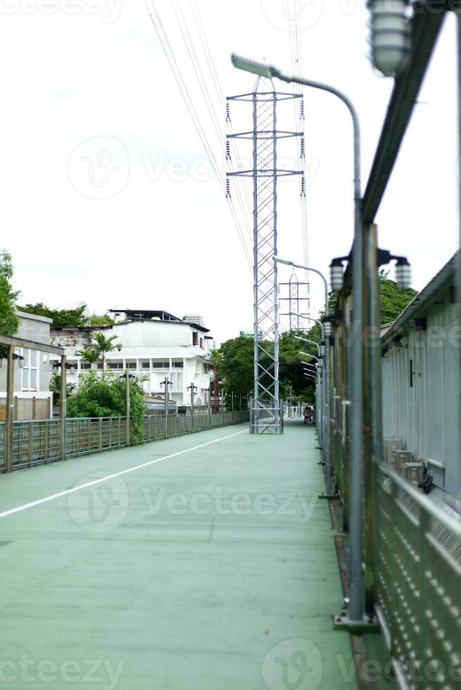 empty Walkway stairway bridge over river in the city garden landscape with no people photo