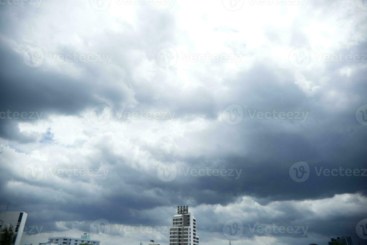 dark blue cloud with white light sky background and city light midnight evening time photo