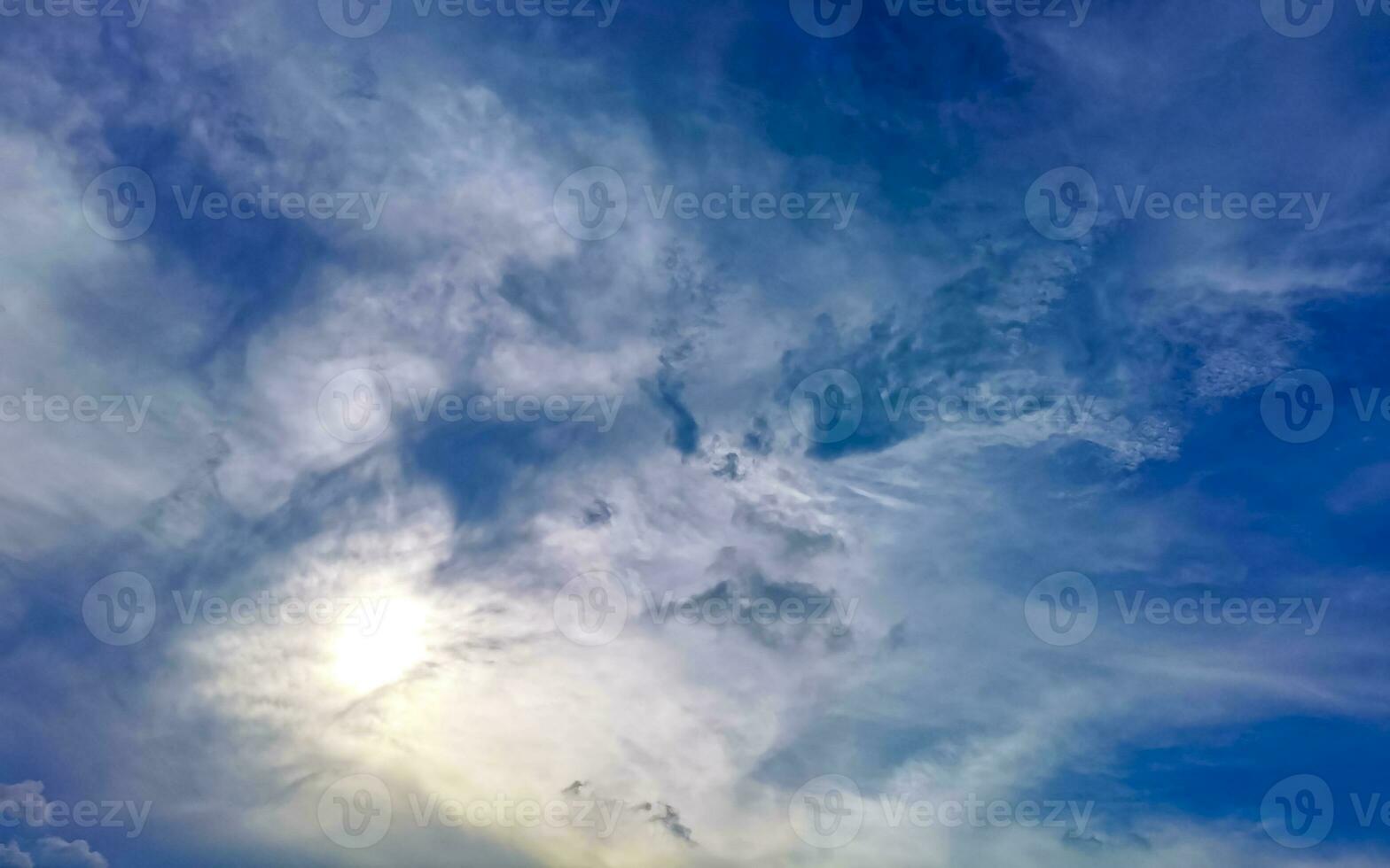 Blue sky with chemical chemtrails cumulus clouds scalar waves sky. photo