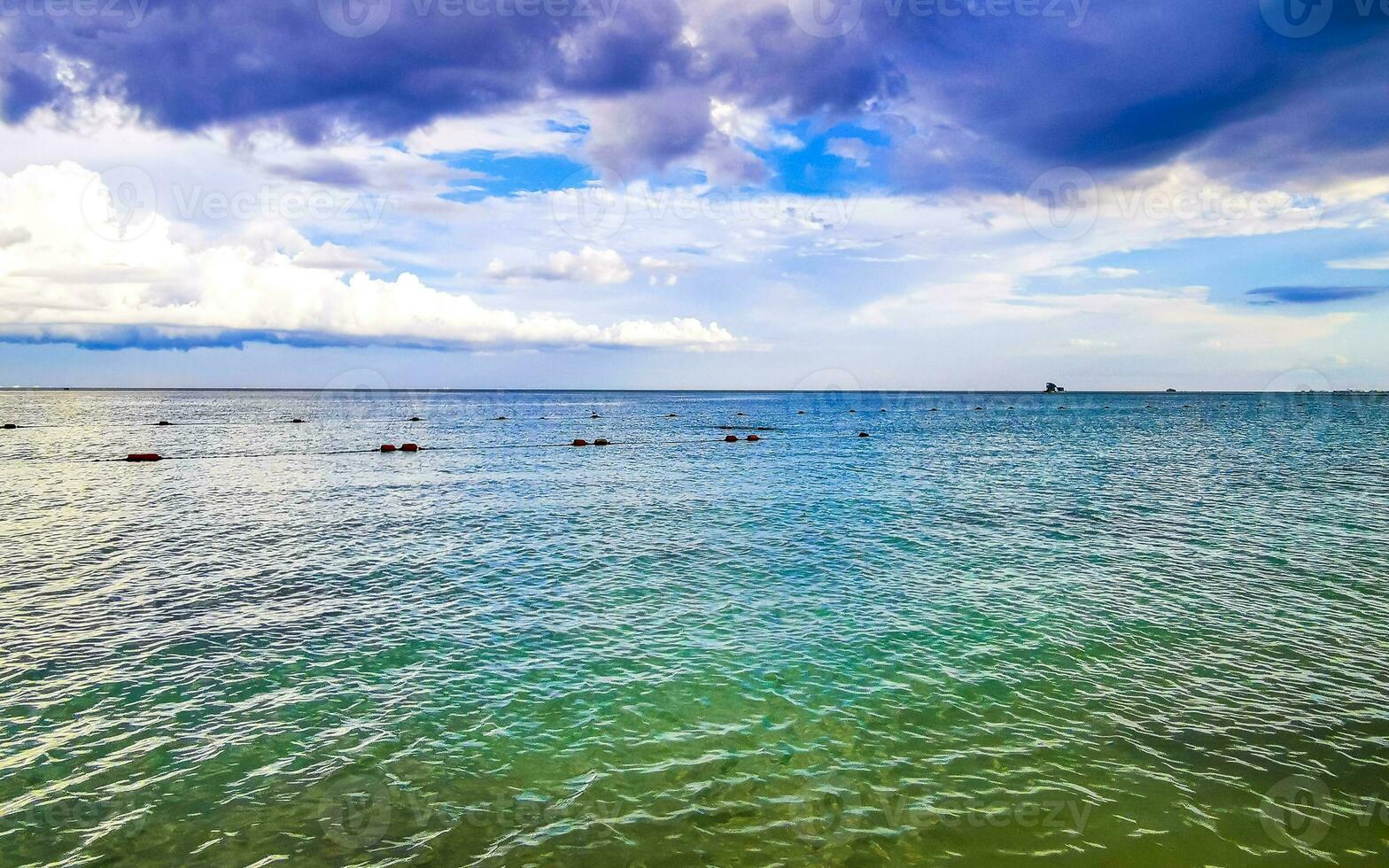 Tropical Caribbean beach clear turquoise water Playa del Carmen Mexico. photo