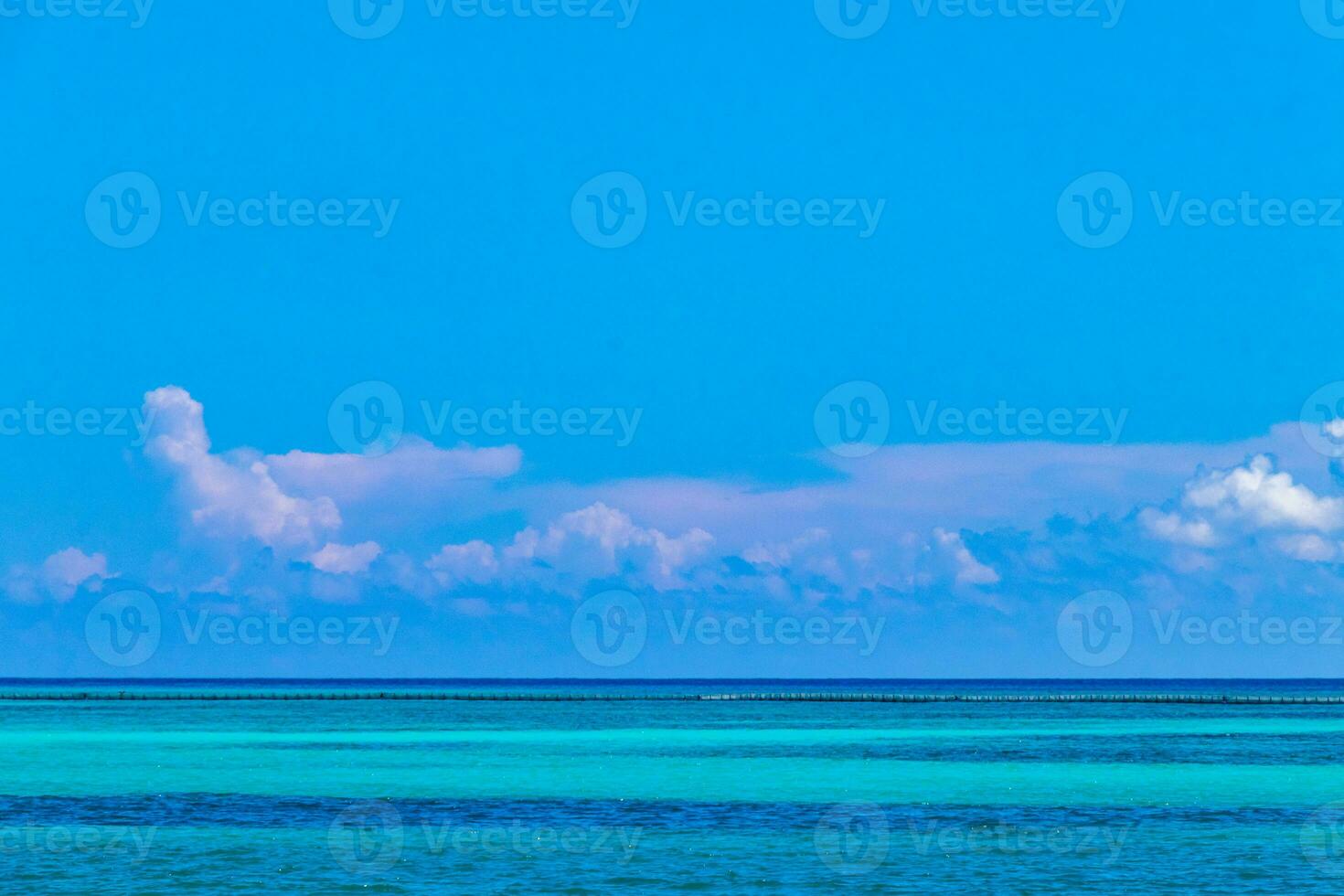 Tropical Caribbean beach clear turquoise water Playa del Carmen Mexico. photo