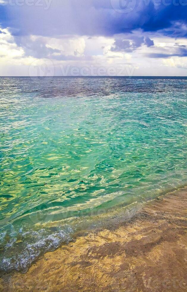 Tropical Caribbean beach clear turquoise water Playa del Carmen Mexico. photo