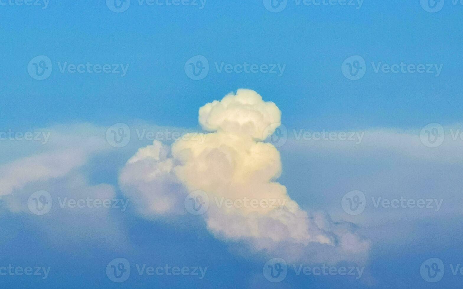 Explosive cloud formation cumulus clouds in the sky in Mexico. photo