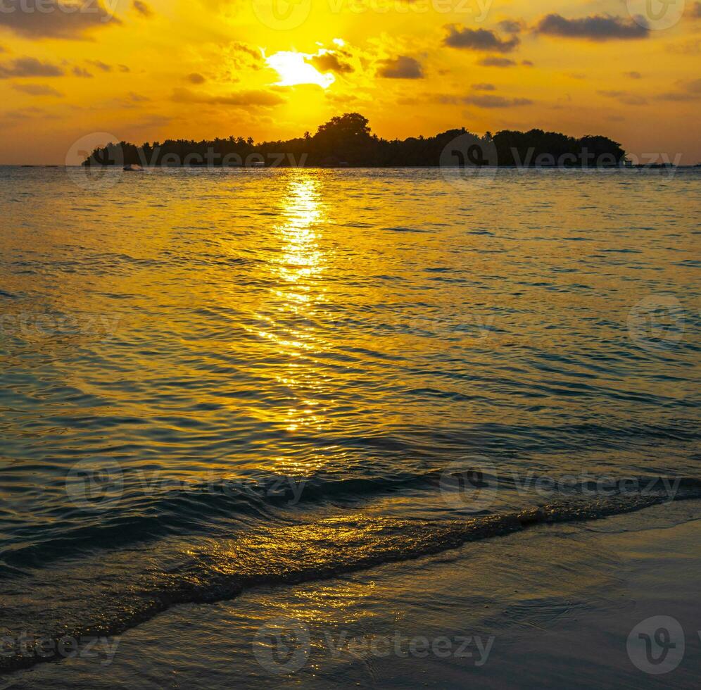 Kuramathi Maldives tropical paradise island sunset view from Rasdhoo. photo