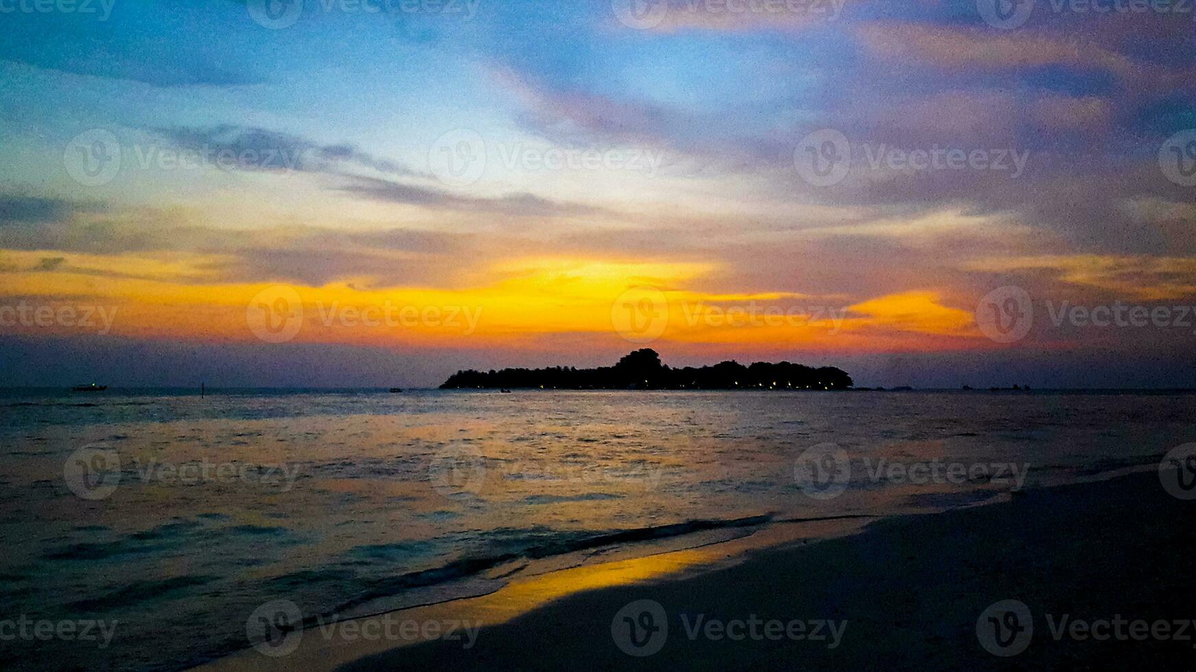 Kuramathi Maldives tropical paradise island sunset view from Rasdhoo. photo