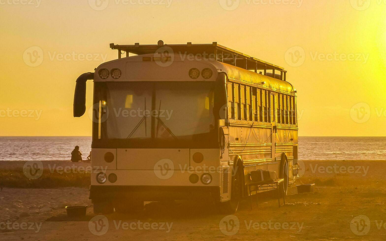 Camper bus car at sunset in Puerto Escondido Oaxaca Mexico. photo