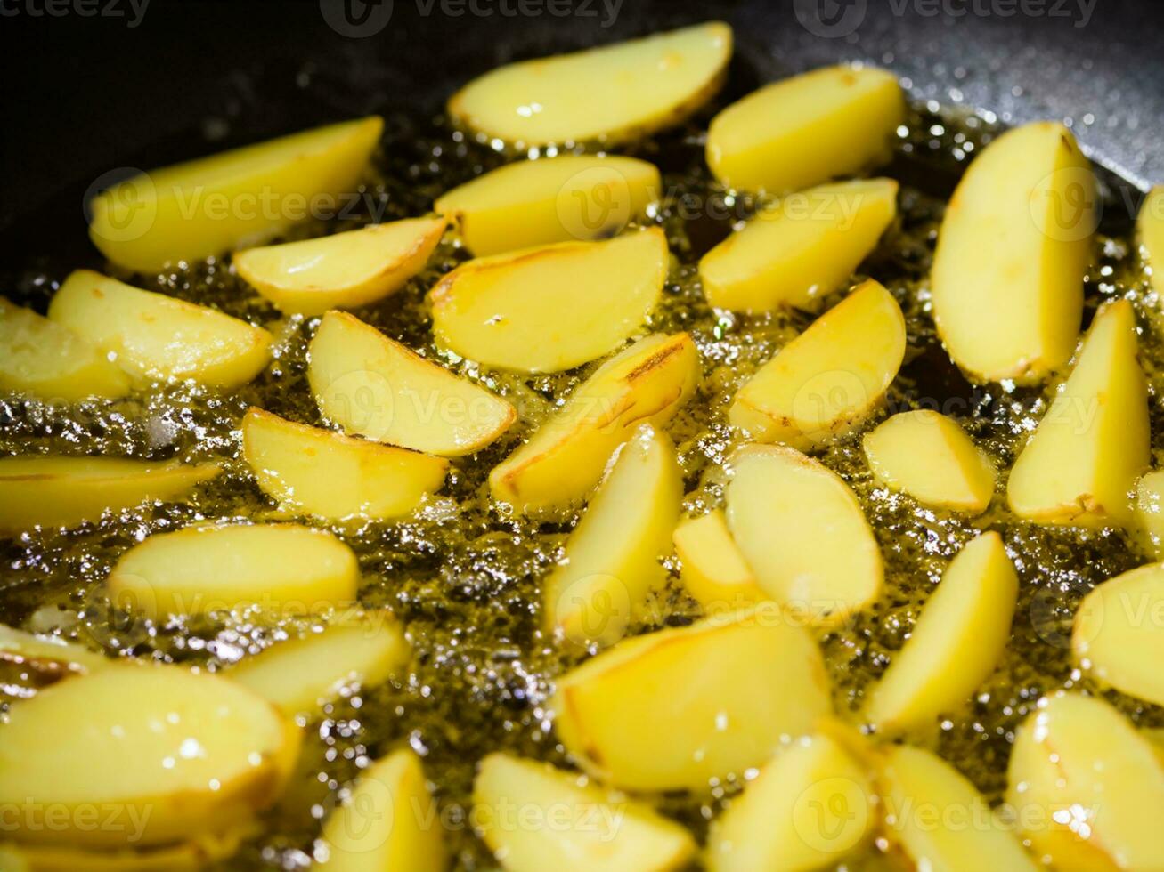fried potatoes in the pan photo