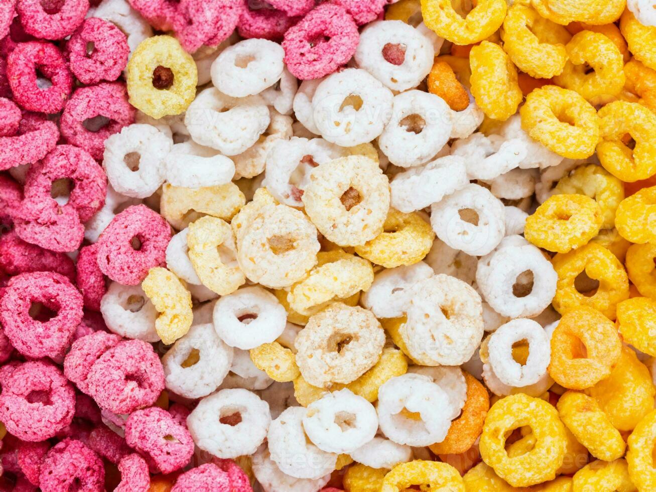 colorful cereal rings on white background. photo