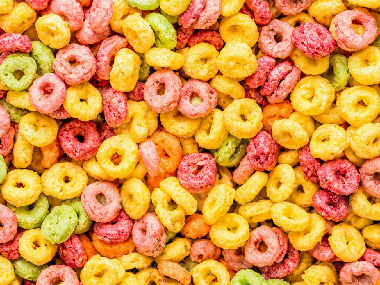 colorful cereal rings on white background photo