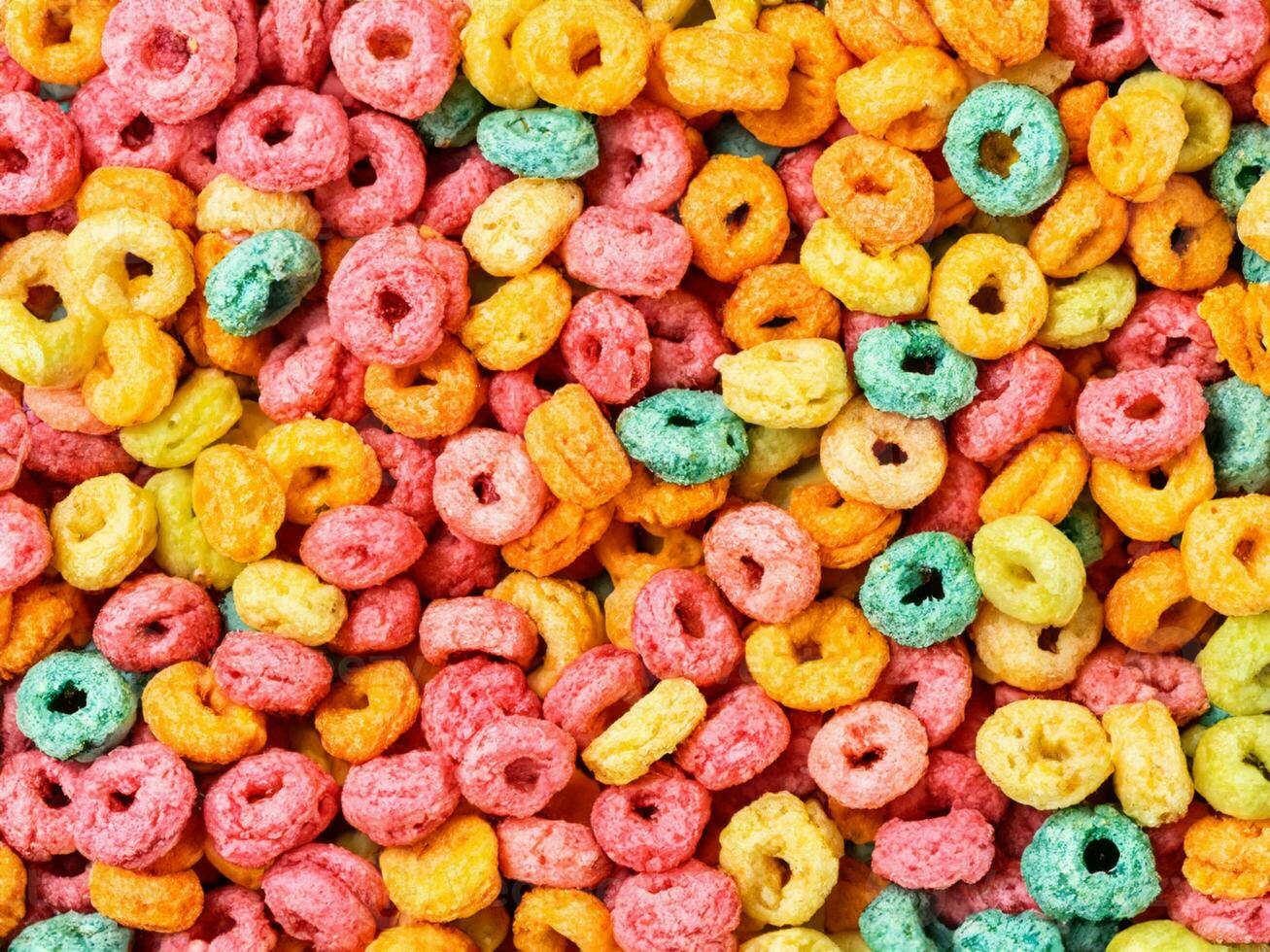 colorful cereal rings on white background photo