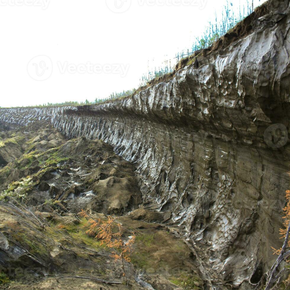 A 100 m high wall of dirty frozen ice. photo