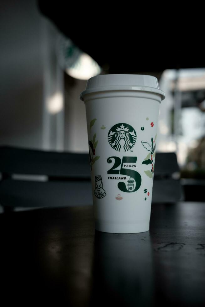 Bangkok, Thailand - October 16, 2023 Limited-edition Starbucks Reusable Cup with a special 25th Anniversary design. photo