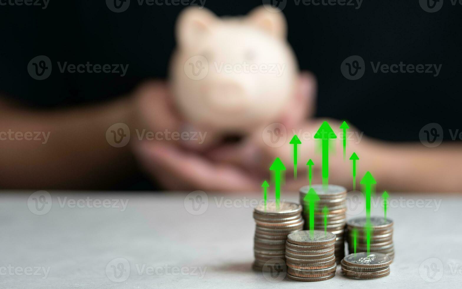 Interest rate and dividend concept. Symbol up arrow on stack of coin and man holding piggy bank photo