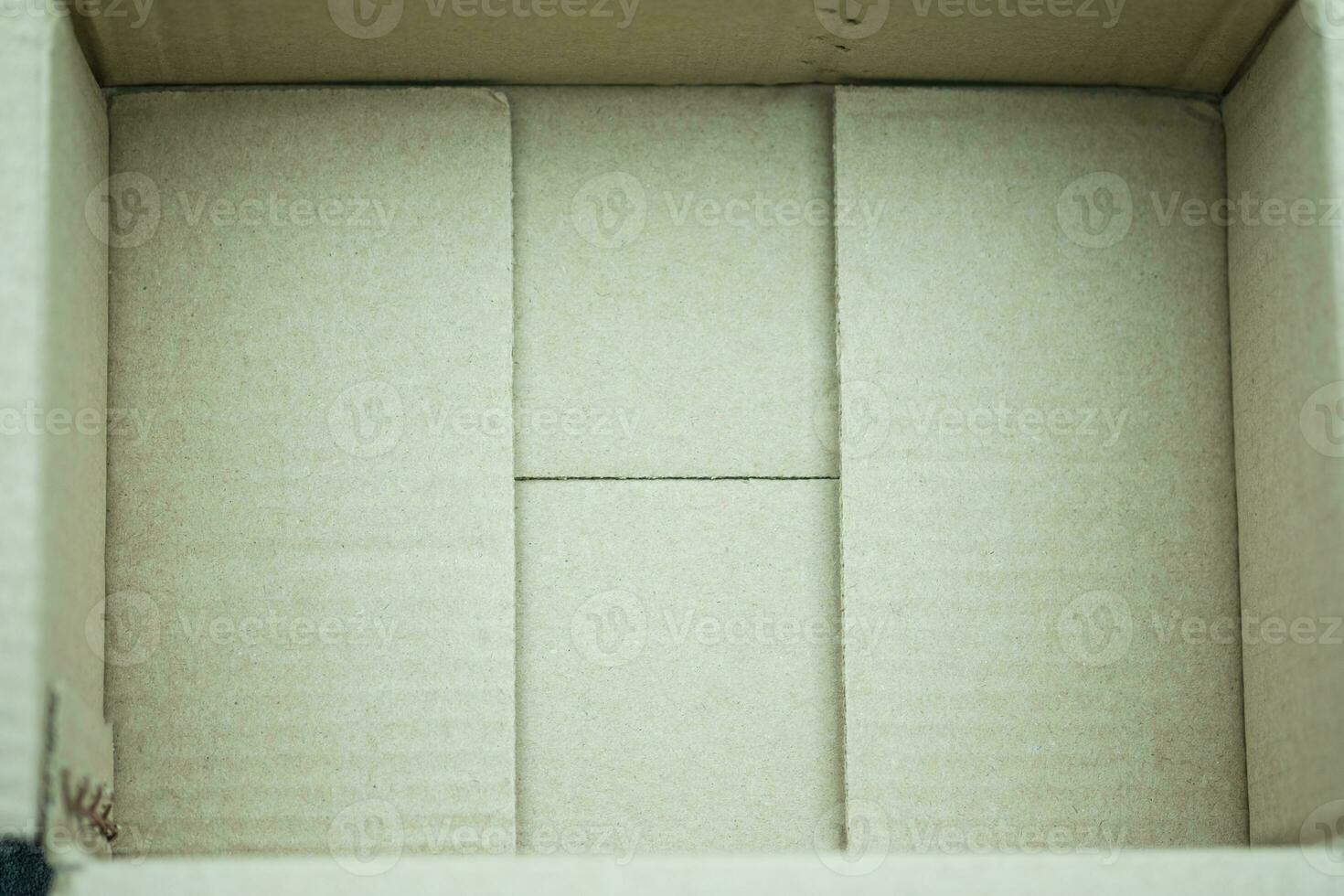 Empty inside brown paper box carton package open packing photo