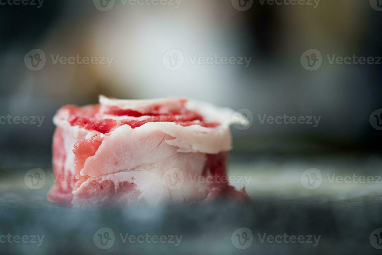 Premium rare slices of beef looks like flowers served for Sukiyaki and Shabu. photo