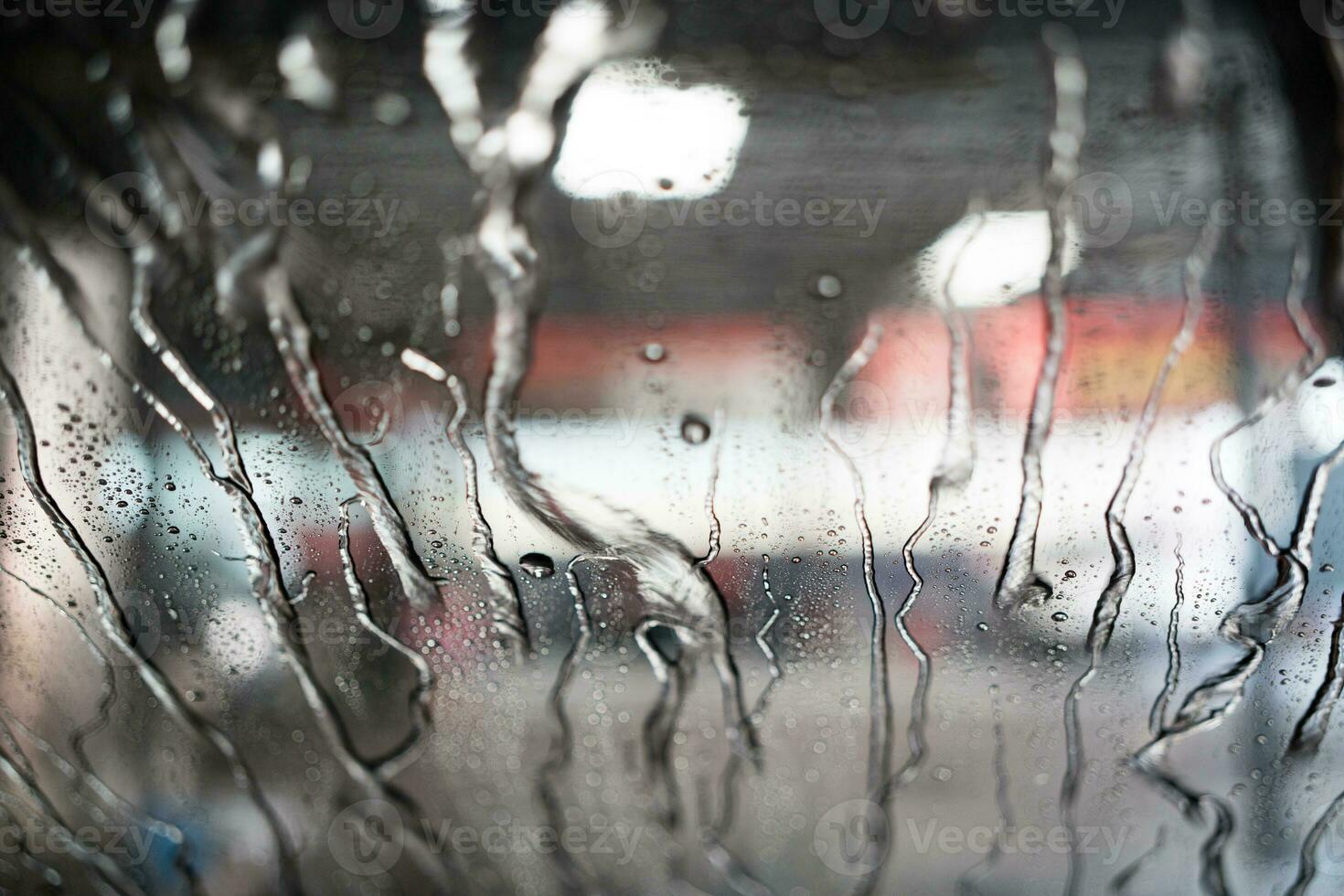 Water stains on the windshield. View from inside. photo