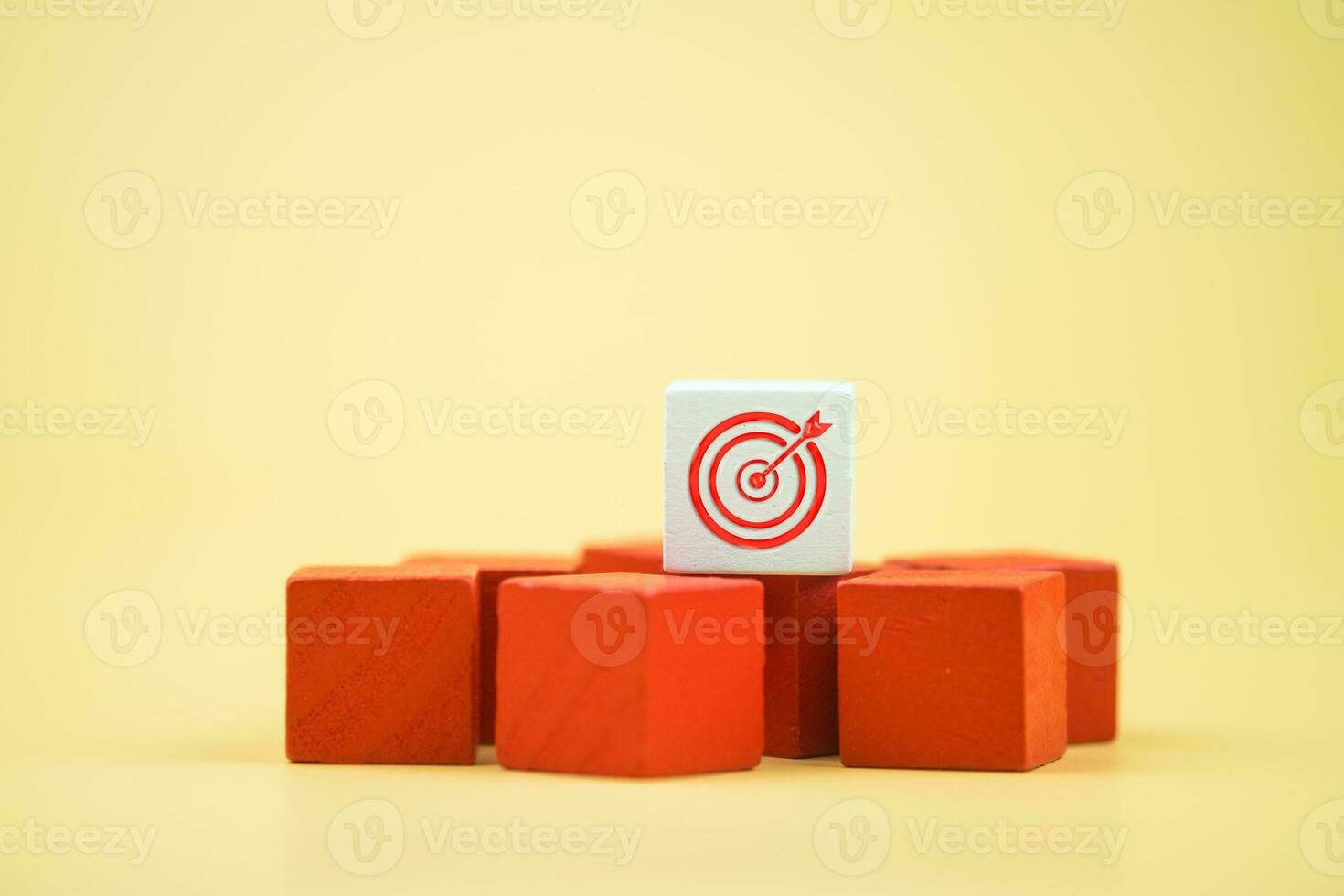 Target icon on wooden block. Business agenda and mission setting concept photo