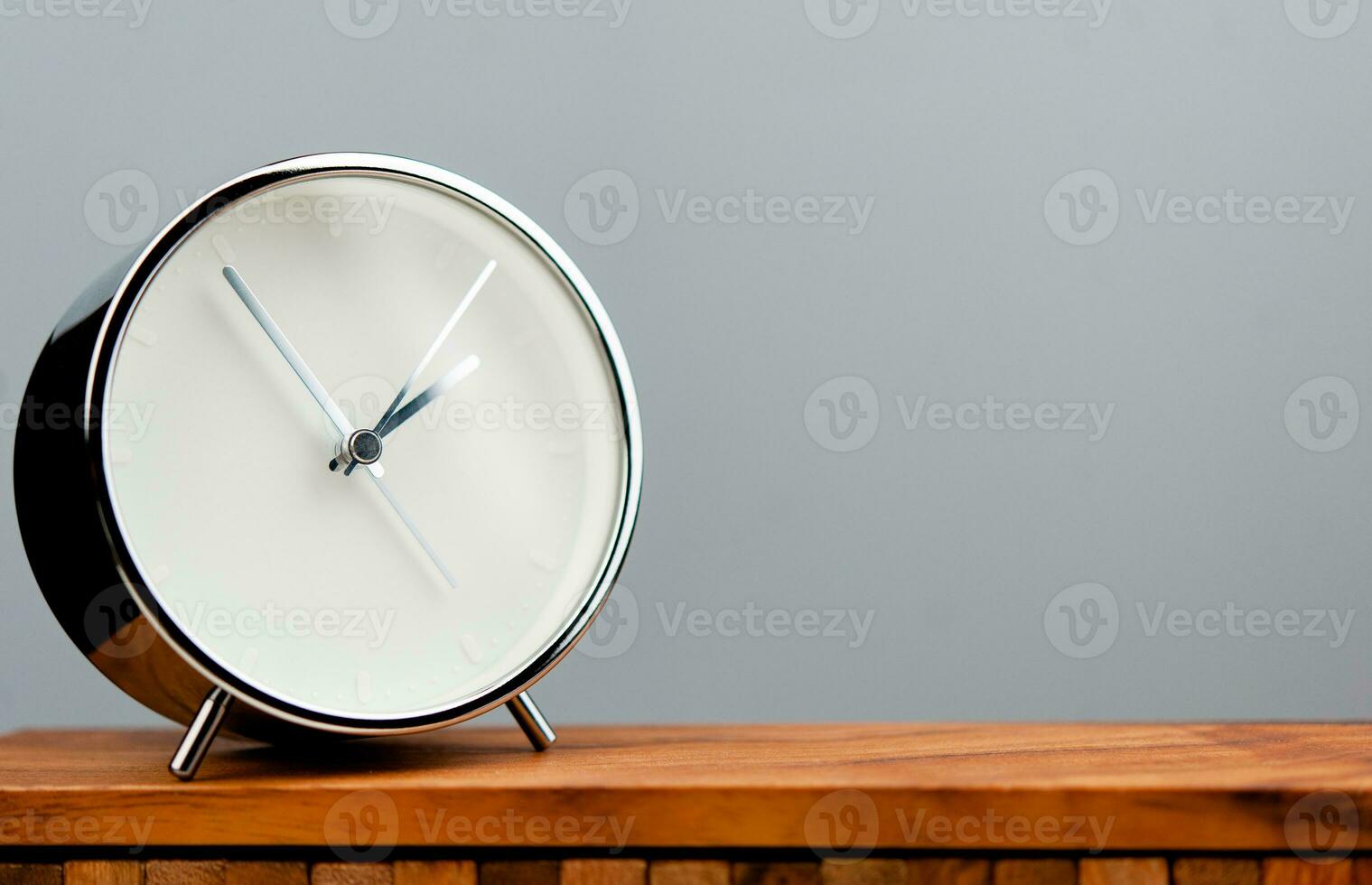 Alarm clock, modern clock, work with time, appointments, punctuality, rules of time, stationary clock hands. The importance of time and lifestyle photo