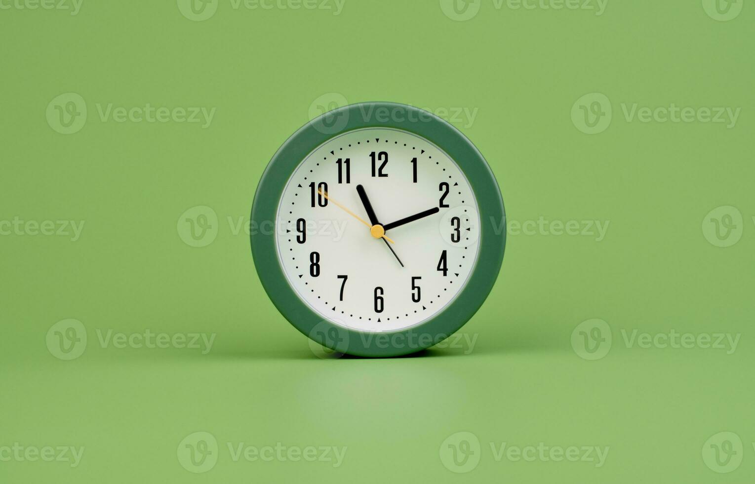 Modern alarm clock. Stop clock hands. working with time daily life Punctuality, rules of time photo