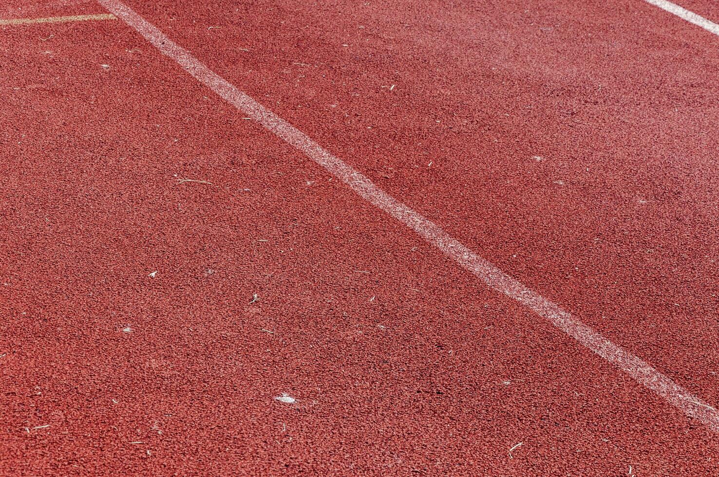 Running track with white line texture,sports texture for background photo