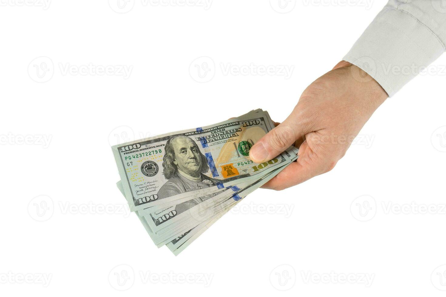 usd efectivo en mano aislado sobre fondo blanco. asignación de dinero, concepto de economía foto