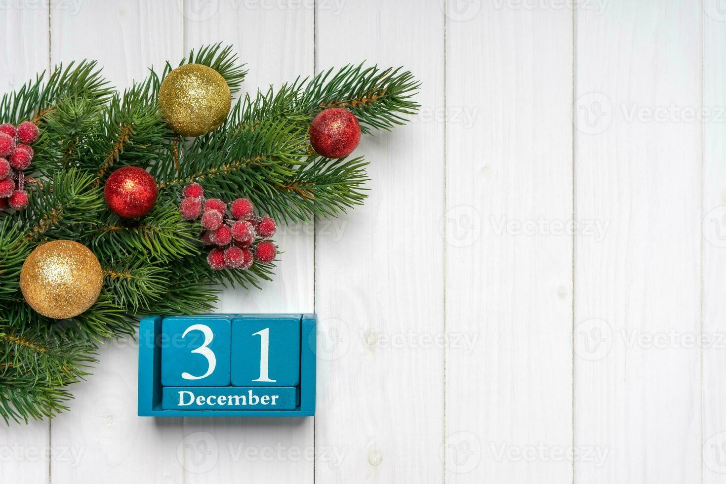 New Year background with decorated fir tree and blue perpetual calendar. Top view, flat lay with copy space photo