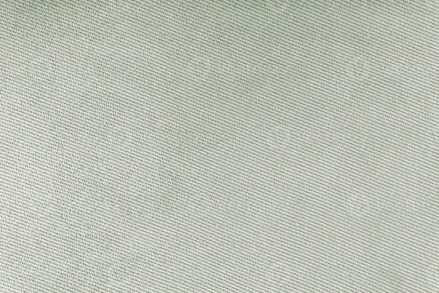 Texture of gray fabric diagonal weave pattern. Decorative textile background photo