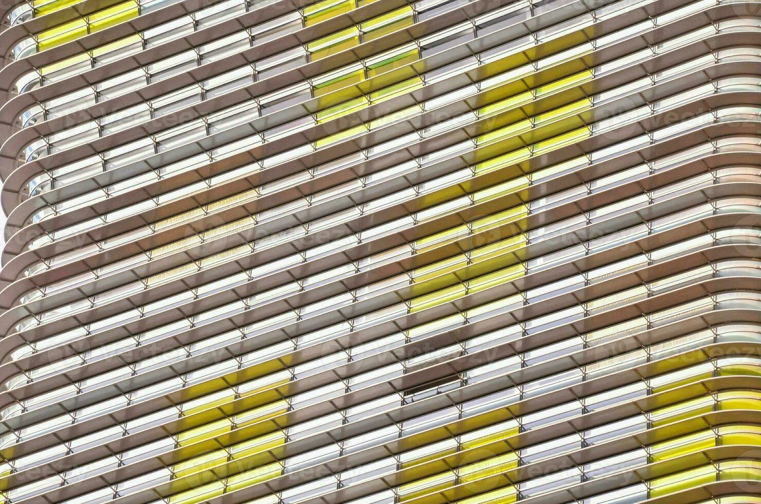 a building with yellow and white stripes on it photo