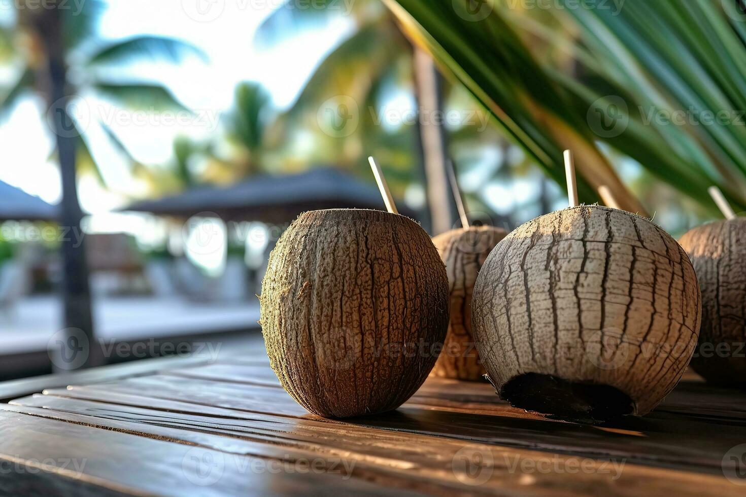 A photo of young coconuts an wooden table with a tiki beach bar blurred background Generative AI